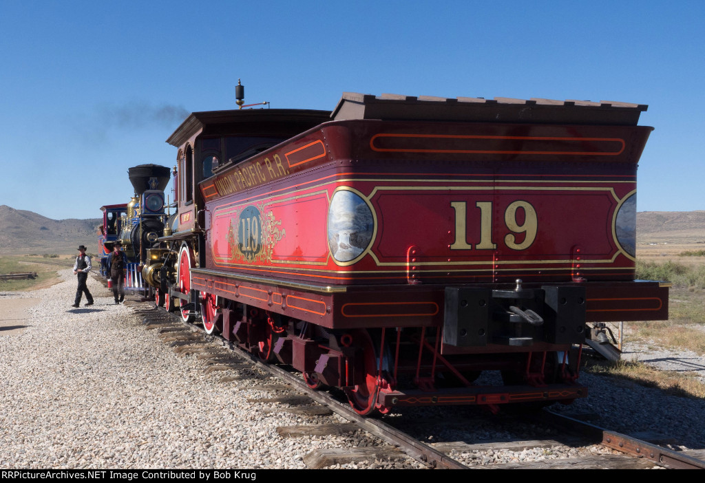 Nice looking behind!  UP 119's attractively painted tender 